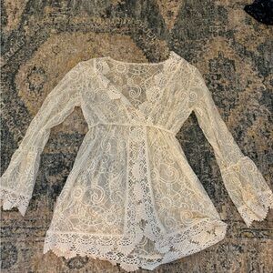 Cute lacy swim cover up very see through